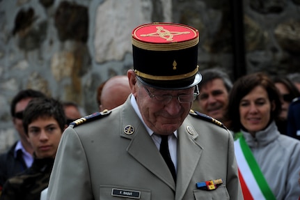 Francis Raout prepares to deliver his speech at the Italian Commemoration ceremony for the B-17 of the Aguille des Glaciers, Sept. 3 in Courmayeur, Italy.   Raout was a member of the Alpine Infantry and was among the first to find the B-17 wreckage in 1947. The entire B-17 crew was lost after their aircraft went down on Aiguille des Glaciers, one of the rugged peaks in the French Alps. Raout is the vice president of the committee for the commemoration of the B-17 of the Aiguille des Glaciers.  (U.S. Air Force photo/Staff Sgt. Nicole Mickle)  
