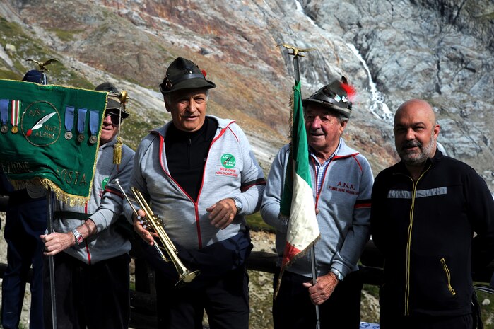 Veterans of the Alpine Infantry gather before the Italian Commemoration Ceremony for the B-17 of the Aguille des Glaciers, Sept. 3, in Courmayeur, Italy.  Members of the Alpine Infantry were the first to find the B-17 wreckage in 1947.  Lieutenant Colonel Rebecca Sonkiss, 15th Airlift Squadron commander and 12 other Team Charleston Airmen participated in two commemoration ceremonies for the crew of B-17 #43-39388 in Courmayeur,  and Bourg Saint Maurice, France. The B-17 crew was from the 15th Troop Carrier Squadron which is now the 15th AS.  Dignitaries and family members of the crew were in also in attendance.  (U.S. Air Force photo/Staff Sgt. Nicole Mickle)   
