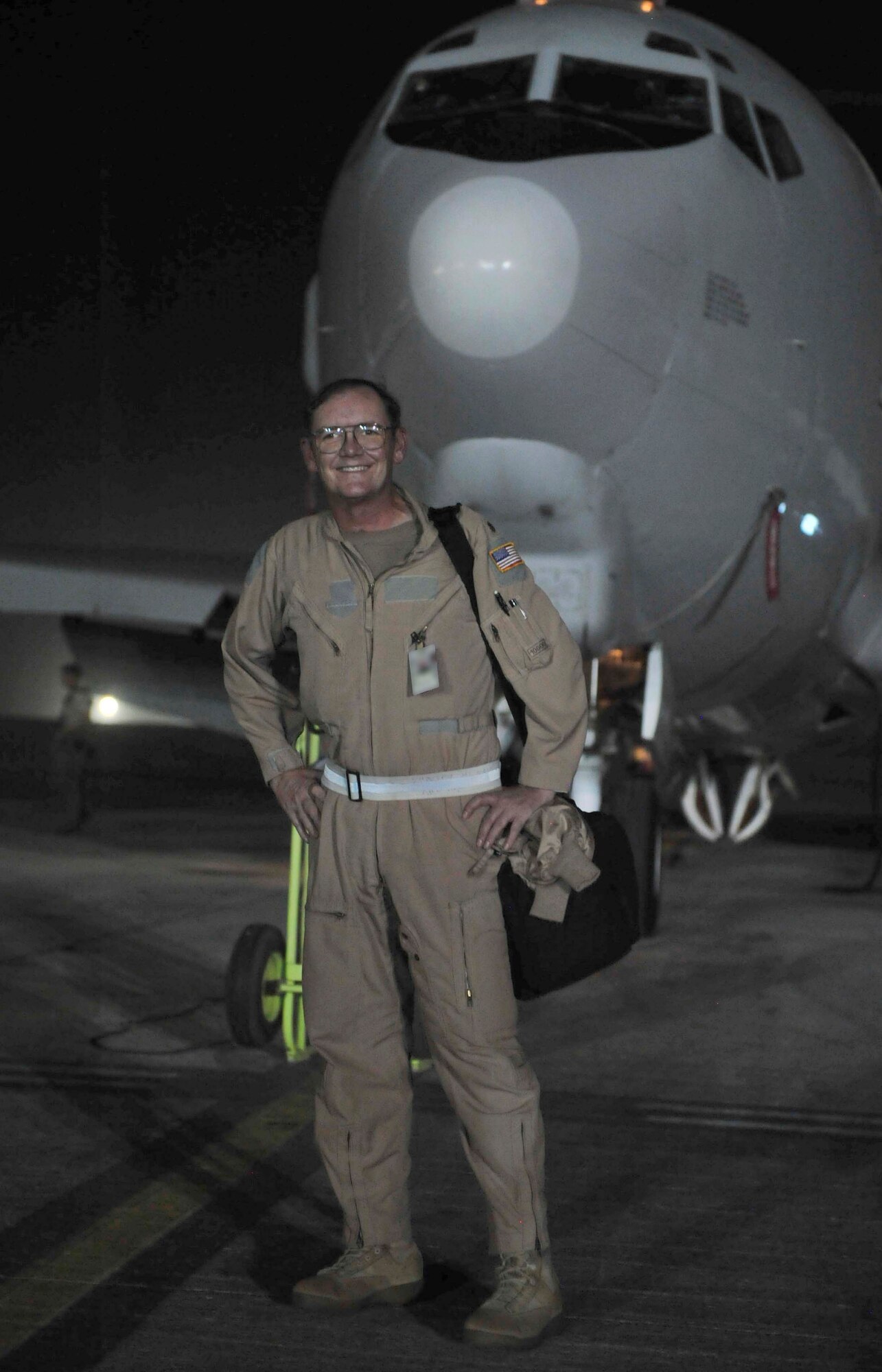 Maj. Jon Williams, a mission crew commander for the 963rd Expeditionary Airborne Air Control Squadron, poses after his record-setting flight Sept. 5, 2011, at an air base in Southwest Asia. Williams reached 10,195 flying hours on the E-3 Sentry Airborne Warning and Control System, or AWACS, Sept. 5, setting the all-time record for hours flown since the aircraft became operational in the Air Force in 1977. Williams hails from Colorado but now calls Edmond, Okla., his home. (U.S. Air Force photo/Tech Sgt. Patrick Mitchell)
