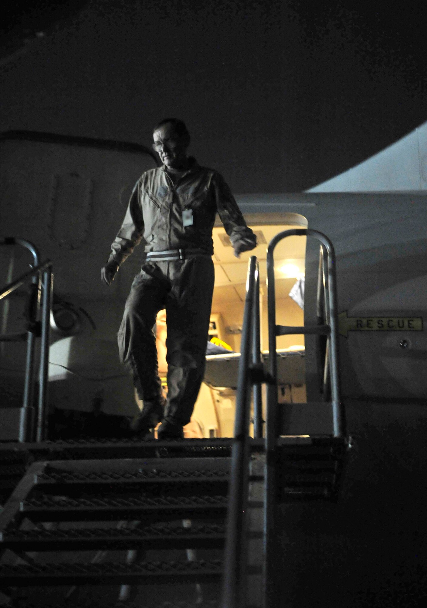 Maj. Jon Williams, a mission crew commander for the 963rd Expeditionary Airborne Air Control Squadron, exits an E-3 Sentry Airborne Warning and Control System, or AWACS, after setting a new Air Force record Sept. 5, 2011 at an air base in Southwest Asia. Williams reached 10,195 flying hours on the AWACS Sept. 5, setting the all-time record for hours flown since the aircraft became operational in the Air Force in 1977. Williams hails from Colorado but now calls Edmond, Okla., his home. (U.S. Air Force photo/Tech Sgt. Patrick Mitchell)