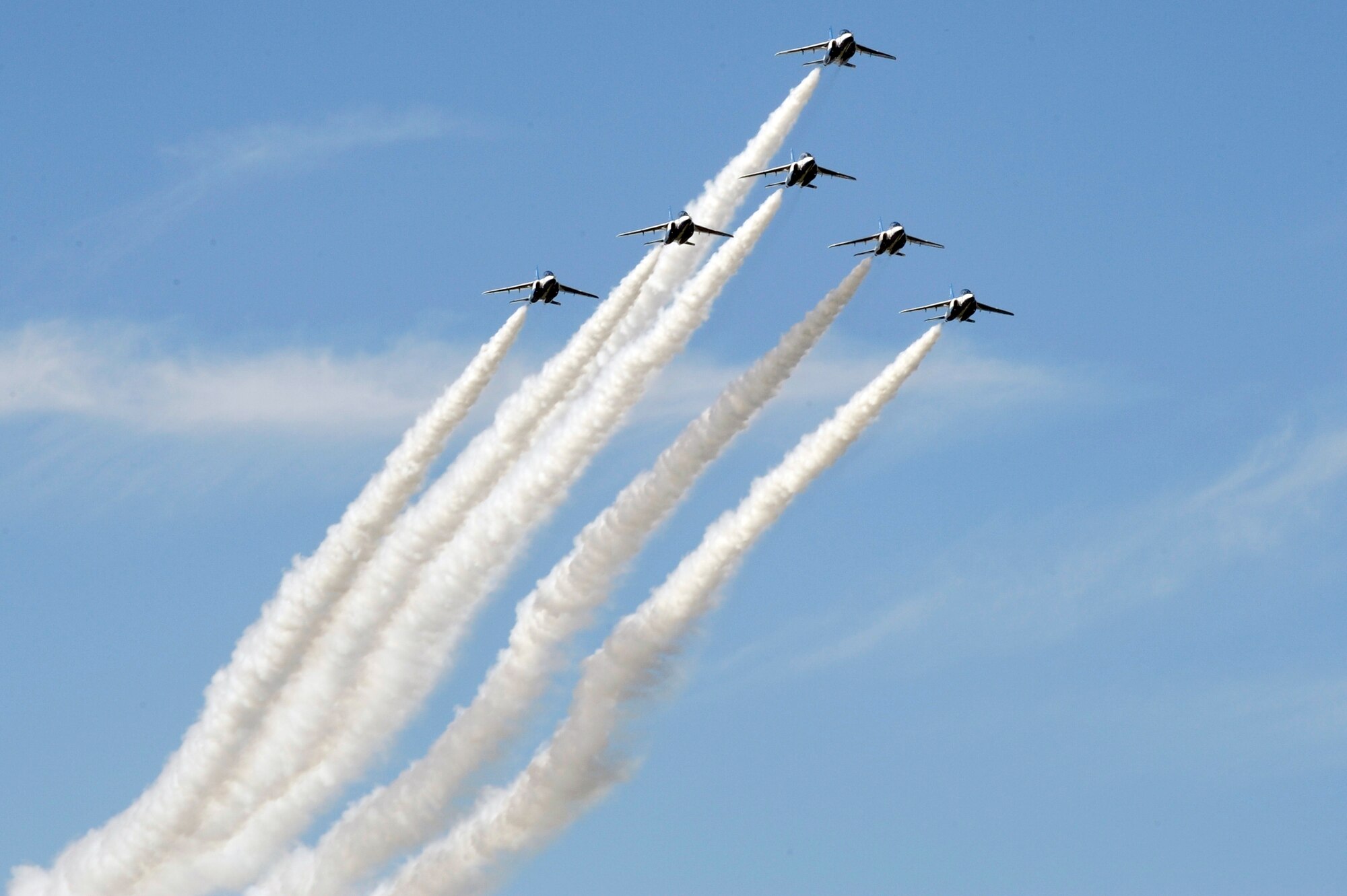 MISAWA AIR BASE, Japan - The Japan Air Self-Defense Force demonstration team "Blue Impulse" performs an aerial maneuver during Misawa's 32nd-annual air fest Sept. 4. Air Fest 2011 was an opportunity for approximately 100,000 attendees to see eight aerial demonstrations with 19 static displays of JASDF, U.S. Air Force, U.S. Navy aircraft and private aircraft operators. Air Fest 2011 also marked the last flight of Miss Veedol, a single-engine aircraft that, in 1931, flew non-stop across the Pacific Ocean from Sabishiro Beach, Misawa, Japan to Wenatchee, Washington, U.S. (U.S. Air Force photo/Tech. Sgt. Marie Brown)