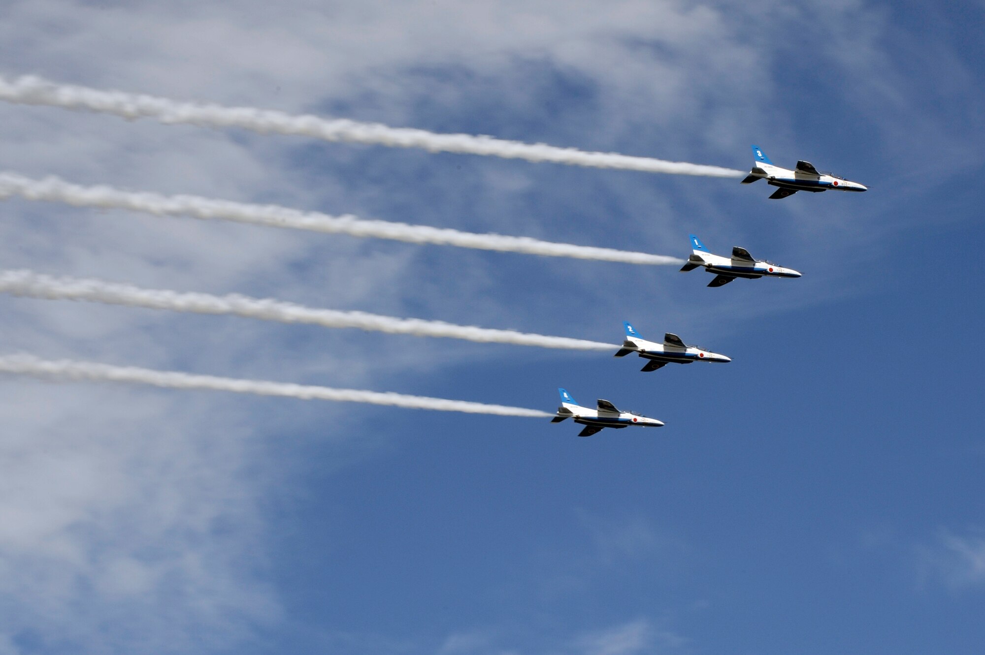 MISAWA AIR BASE, Japan - The Japan Air Self-Defense Force demonstration team "Blue Impulse" performs an aerial maneuver during Misawa's 32nd-annual air fest Sept. 4. Air Fest 2011 was an opportunity for approximately 100,000 attendees to see eight aerial demonstrations with 19 static displays of JASDF, U.S. Air Force, U.S. Navy aircraft and private aircraft operators. Air Fest 2011 also marked the last flight of Miss Veedol, a single-engine aircraft that, in 1931, flew non-stop across the Pacific Ocean from Sabishiro Beach, Misawa, Japan to Wenatchee, Washington, U.S. (U.S. Air Force photo/Tech. Sgt. Marie Brown)