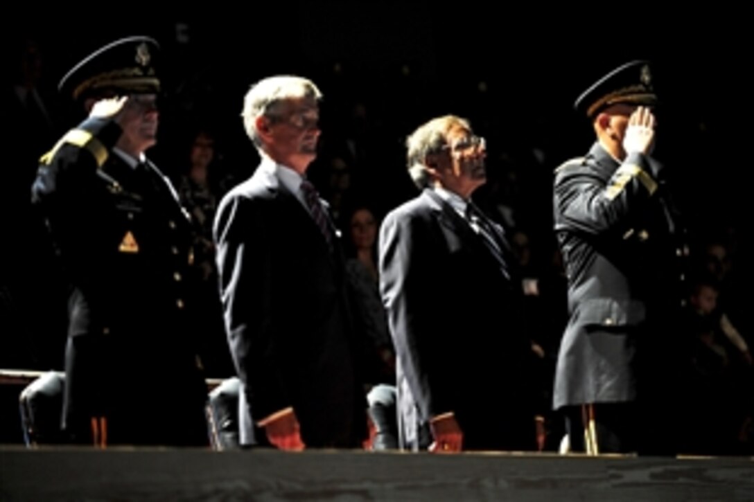 From left to right, outgoing Army Chief of Staff Gen. Martin E. Dempsey, Army Secretary John McHugh, Defense Secretary Leon E. Panetta, and new Army Chief of Staff Gen. Raymond T. Odierno attend a change-of-responsibility ceremony in Conmy Hall on Joint Base Myer-Henderson Hall, Va., Sept. 7, 2011.