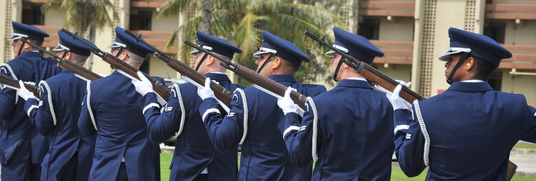 Andersen Air Force Base Honor Guard firing party volleys during a funeral demonstration here Aug. 29. The Base Honor Guard performed a mock funeral form Airman on Andersen. Following the demonstration, the first Andersen AFB Honor Guard graduation was held after two-weeks training. Base Honor Guard training was developed to standardize how ceremonies are performed geared to the specific base’s preference for military ceremonial support. (U.S. Air Force photo by Staff Sgt. Alexandre Montes)