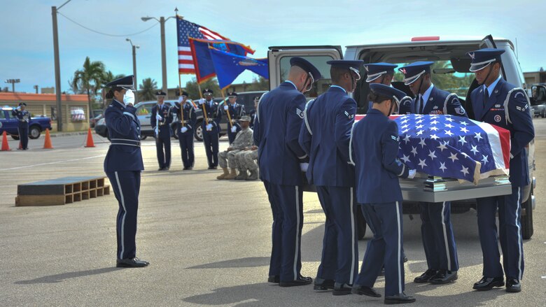 Andersen Air Force Base Honor Guard demonstrates a funeral for Airmen here Aug. 29. The Base Honor Guard performed a mock funeral form Airman on Andersen. Following the demonstration, the first Andersen AFB Honor Guard graduation was held after two-weeks training. Base Honor Guard training was developed to standardize how ceremonies are performed geared to the specific base’s preference for military ceremonial support. (U.S. Air Force photo by Staff Sgt. Alexandre Montes)