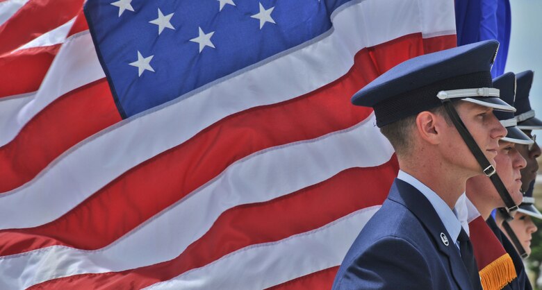 Andersen Air Force Base Honor Guard colors team stand by prior to a funeral demonstration here Aug. 29. The Base Honor Guard performed a mock funeral form Airman on Andersen. Following the demonstration, the first Andersen AFB Honor Guard graduation was held after two-weeks training. Base Honor Guard training was developed to standardize how ceremonies are performed geared to the specific base’s preference for military ceremonial support. (U.S. Air Force photo by Staff Sgt. Alexandre Montes)