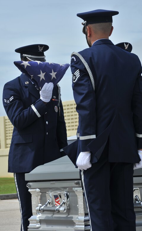 Andersen Air Force Base Honor Guard demonstrates a funeral for Airmen here Aug. 29. The Base Honor Guard performed a mock funeral form Airman on Andersen. Following the demonstration, the first Andersen AFB Honor Guard graduation was held after two-weeks training. Base Honor Guard training was developed to standardize how ceremonies are performed geared to the specific base’s preference for military ceremonial support. (U.S. Air Force photo by Staff Sgt. Alexandre Montes)