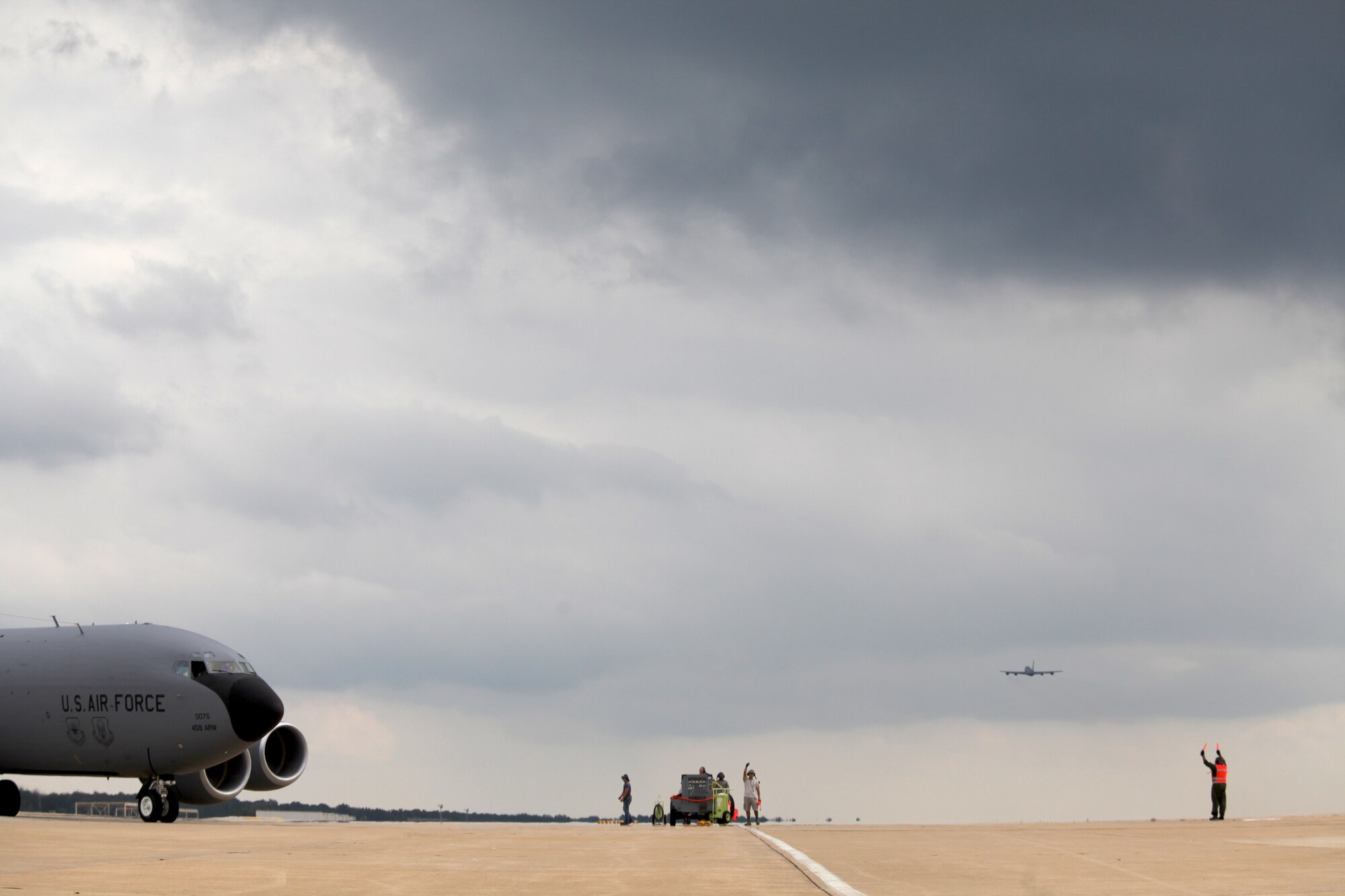 JOINT BASE ANDREWS, Md. -- Maintenance specialists and aircrew from the 459th Air Refueling Wing prepare KC-135 Stratotankers for evacuation ahead of a category three hurricane here Aug. 26. The 459th ARW took numerous safety precautions to protect its personnel, aircraft and facilities from the major storm. (U.S. Air Force photo/1 Lt. Stacee McKee)