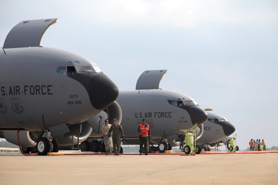 JOINT BASE ANDREWS, Md. -- Maintenance specialists and aircrew from the 459th Air Refueling Wing prepare KC-135 Stratotankers for evacuation ahead of a category three hurricane here Aug. 26. The 459th ARW took numerous safety precautions to protect its personnel, aircraft and facilities from the major storm. (U.S. Air Force photo/1 Lt. Stacee McKee)