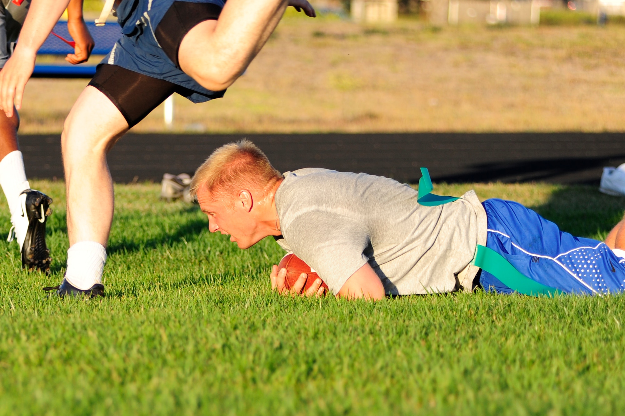 VANDENBERG AIR FORCE BASE, Calif. – 2nd Lt. Chaz Demerath, of the 392nd Training Squadron, sprints for the goal line during a flag football tournament at the base track field here Wednesday, Sept. 8, 2011. The 392nd TRS Team 2 triumphed over the 381st Training Support Squadron Team 2 scoring 26 to 6. (U.S. Air Force photo/Senior Airman Lael Huss)