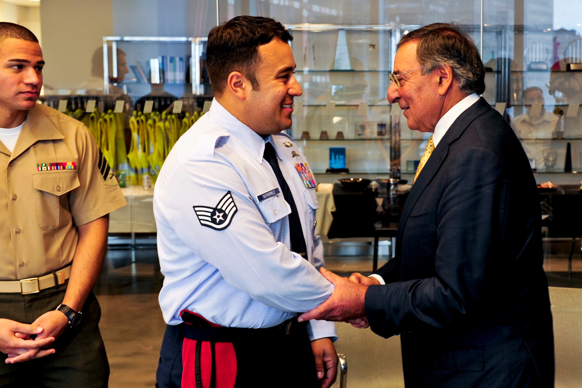 During a meeting with joint service members, Defense Secretary Leon Panetta shakes the hand of U.S. Air Force Staff Sgt. Robert Gutierrez Jr., a combat controller who was awarded the Bronze Star with Valor for his actions in Afghanistan, following a visit to the 9-11 Memorial and One World Trade Center site in New York City, Sept. 6, 2011.  (DoD photo by Tech. Sgt. Jacob N. Bailey, U.S. Air Force) (Released)