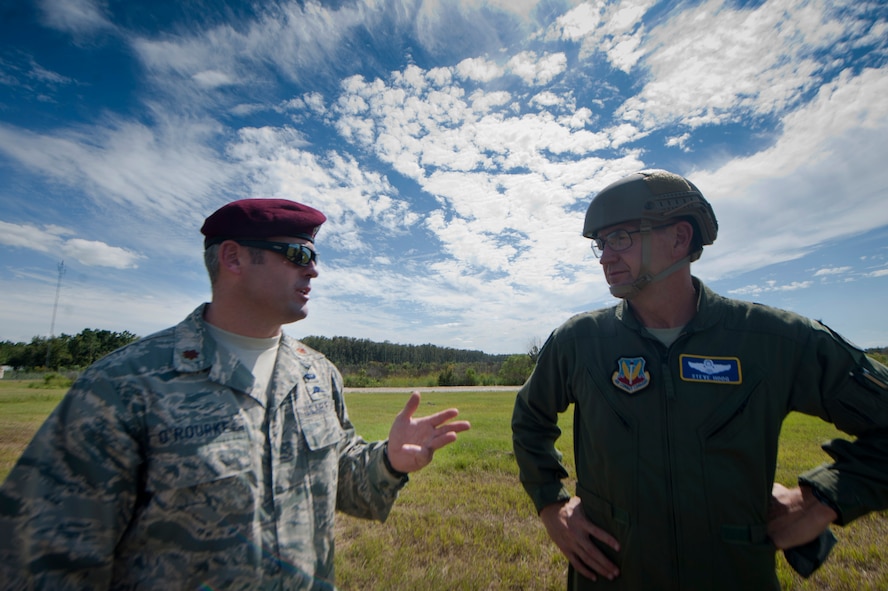 U.S. Air Force Maj. Patrick O’Rourke, 38th Rescue Squadron (RQS) commander, speaks to Maj. Gen. Stephen Hoog, 9th Air Force commander, about his squadron’s mission capabilities during Hoog’s visit to Moody Air Force Base, Ga., Sept. 7, 2011. The 38th RQS showed Hoog how they are capable of rescuing a trapped victim from a car. (U.S. Air Force photo by Airman 1st Class Joshua Green/Released)
