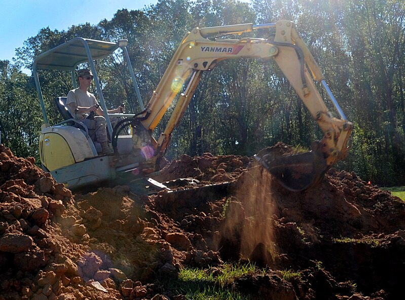 Staff Sgt. William Meadows, 2nd Civil Engineer Squadron, digs a trench for a sewer line near Cullen Park on Barksdale Air Force Base, La., Sept. 7. The 2 CES water and fuels shop is currently working on 15 different projects throughout the base. (U.S. Air Force photo/Senior Airman Kristin High)(RELEASED)