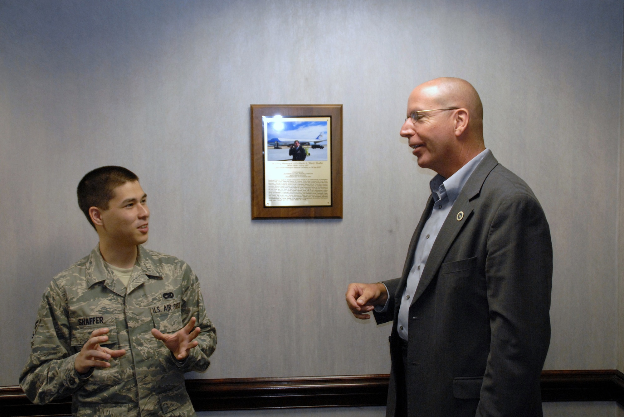 WRIGHT-PATTERSON AIR FORCE BASE, Ohio - Senior Airman Kevin Shaffer, 87th Aerial Port Squadron, and Mr. John Polhemus, deputy chief of flightline protocol, share a moment in the Lt. Col. Martin Shaffer DV suite. (U.S. Air Force photo/Master Sgt. Charlie Miller)