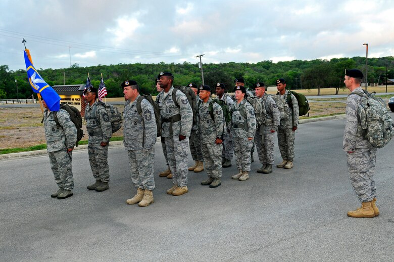 U.S. Air Force and Air National Guard Security Forces prepare to embark on "The Ruck March to Remember 9/11" from Lackland Air Force Base, Texas, July 12, 2011.(Air National Guard photo by Senior Master Sgt. Miguel D. Arellano/Released)