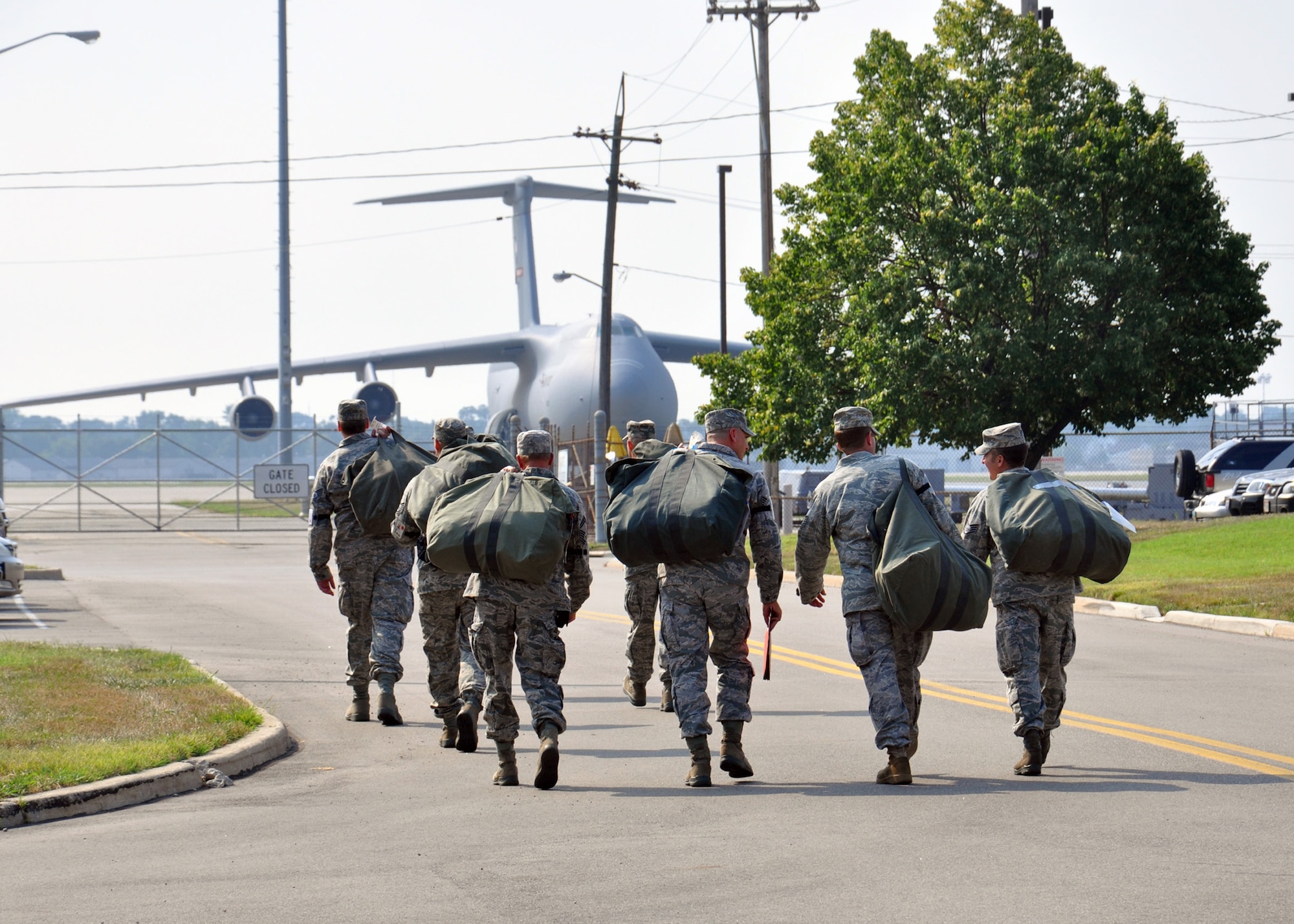 WRIGHT-PATTERSON AIR FORCE BASE, Ohio - 445th Airlift Wing reservists depart from a deployment briefing and proceed to their deployed work areas during the wing's deployment exercise Aug. 6. (U.S. Air Force photo/Senior Airman Matthew Cook)