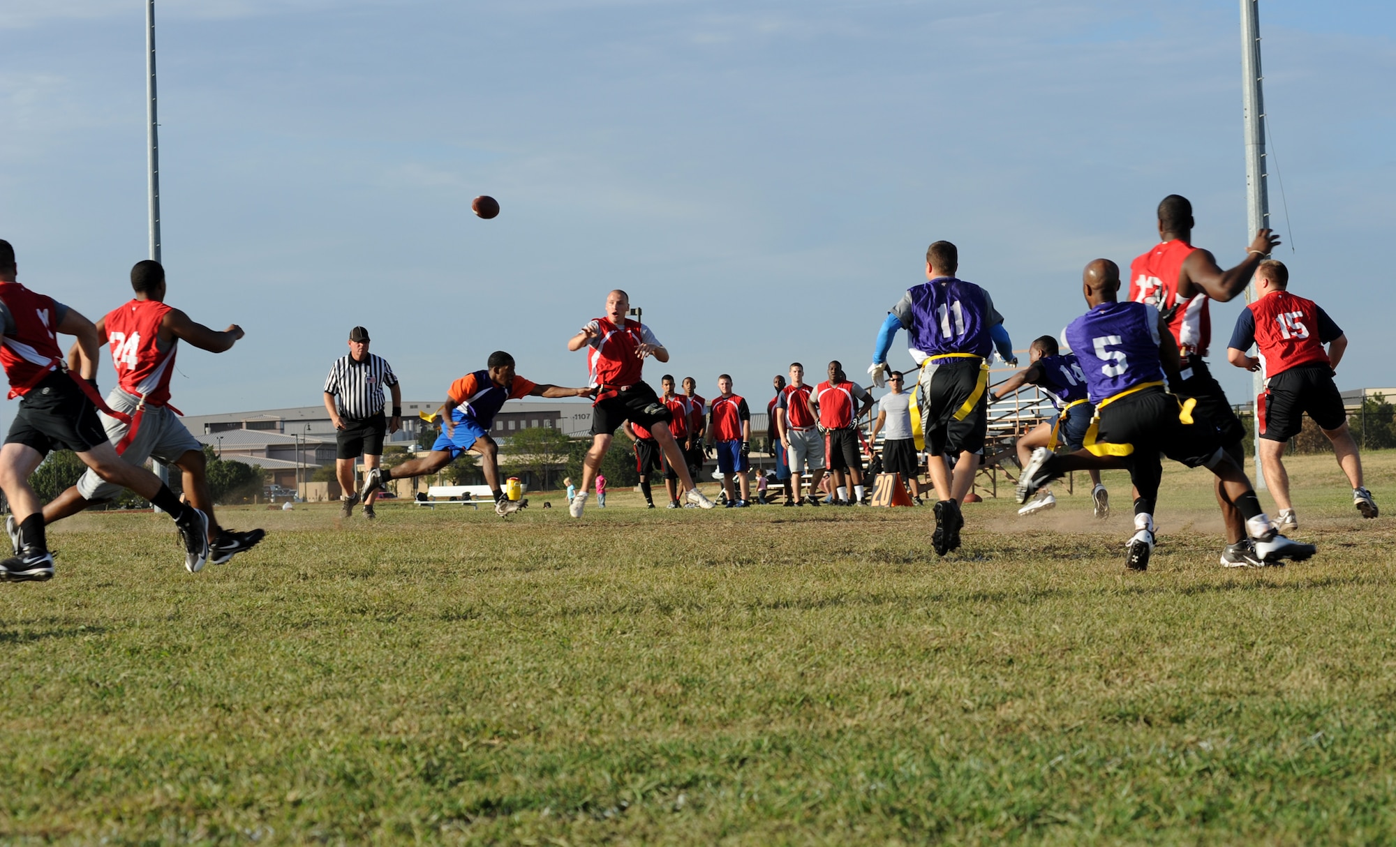 Members from the 22nd Medical Group and 22nd Aircraft Maintenance Squadron play intramural flag-football Sept. 7, 2011, McConnell Air Force Base, Kan. The 22nd MDG won the game in overtime 12-6.  The football season opened Sept. 6 and will continue until mid-October. (U.S. Air Force photo by Airman 1st Class Laura L. Valentine)