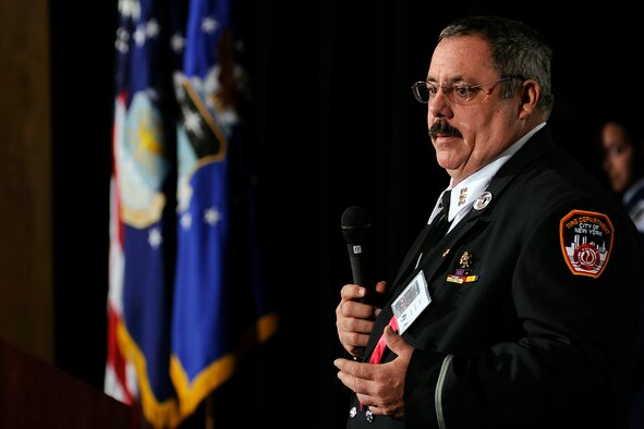 David Russell III speaks with cadets and faculty members at the Air Force Academy's Falcon Heritage Forum Sept. 7, 2011. Russell, a fourth-generation firefighter, retired from the Fire Department of New York in November 2008 and retired from the New York Air National Guard as a technical sergeant in November 2005. He spent four straight days at ground zero after the Sept. 11, 2001, terrorist attacks, and continued working at the site until March 30, 2002. (U.S. Air Force photo/Mike Kaplan)