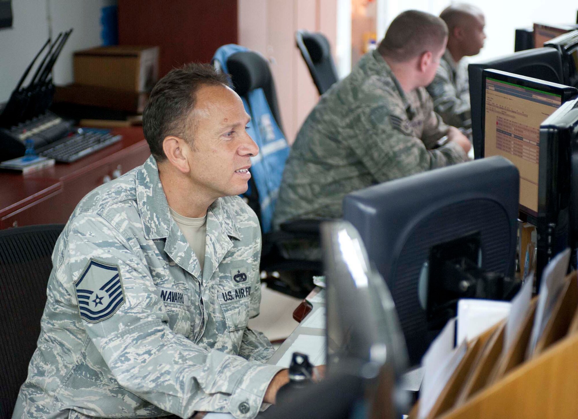Air Force Master Sgt. Alfredo Navarro checks a database at the Air Transport Operations Center Sept. 6, 2011 at Incirlik Air Base, Turkey. Navarro is currently deployed here from the 86th Aerial Port Squadron, McChord Field, Wash., and volunteered to extend his tour at Incirlik for an additional six months. (U.S. Air Force photo by Senior Airman Clayton Lenhardt)