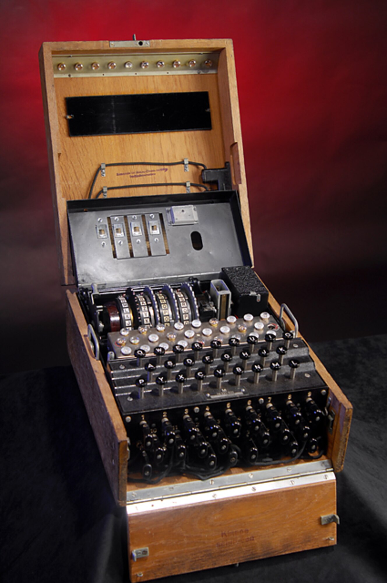 The four-rotor German Enigma machine is an electro-mechanical encryption machine used during World War II.  Theoretically, the Enigma was a very secure machine.  For example, with three rotors in use, the machine could step 17,575 times without repeating.  By rearranging the rotors, 105,456 (17,576X 6) settings were possible without repetition.  Other Enigma variations—plug boards, additional rotors, etc.—could increase the permutations to the astronomical figures of 5,172,165,503,971,832,752,302,775,832,450,730,650 followed by 51 zeros.  (Courtesy photo/AF ISR Agency History Office)