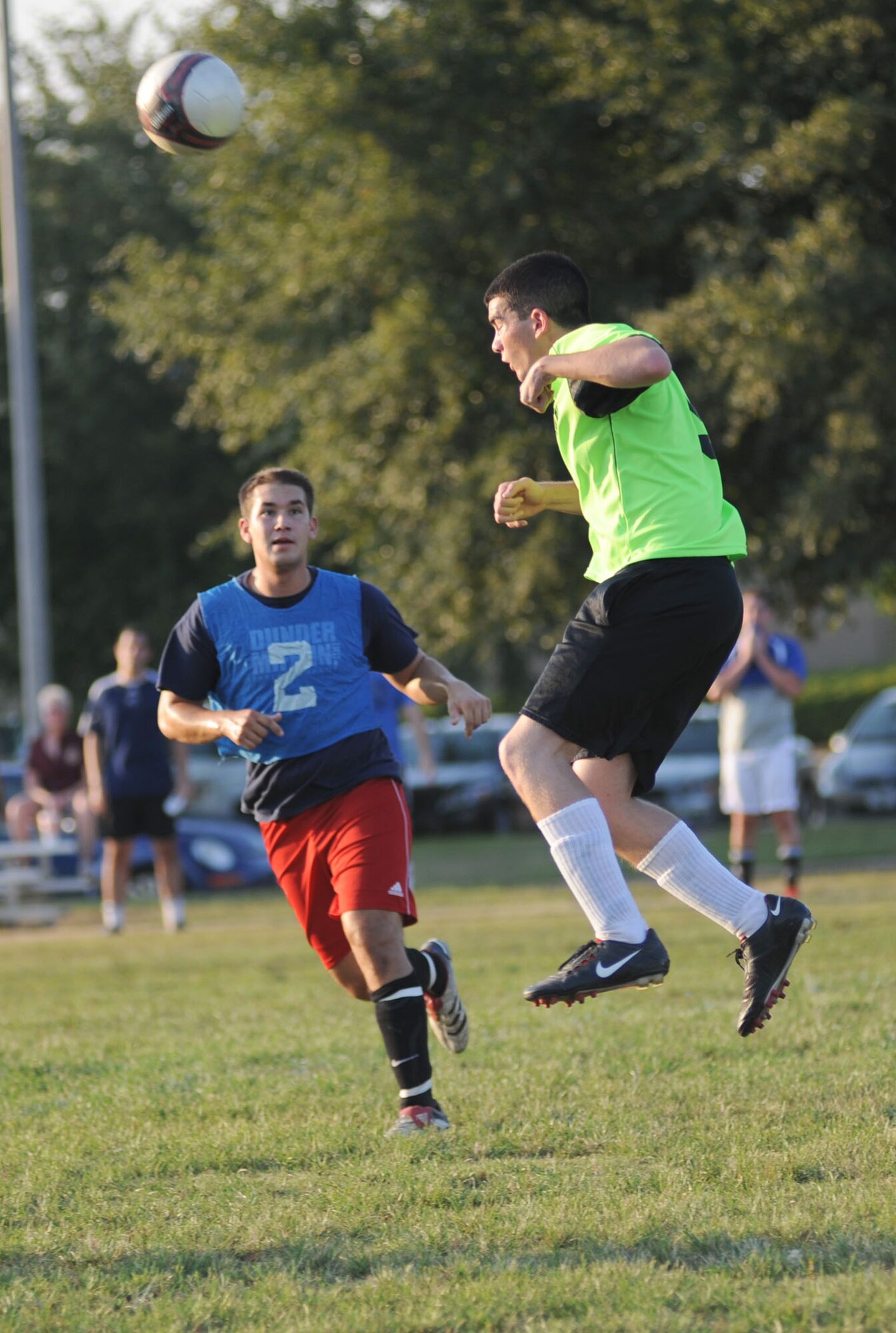 Travis Lyon, left, 333rd Training Squadron, and Calvin Robertson, 338th TRS, battle for the ball during the championship game. The 338th TRS won the base  championship with a 6-3 victory Aug. 31.  (U.S. Air Force photo by Kemberly Groue)