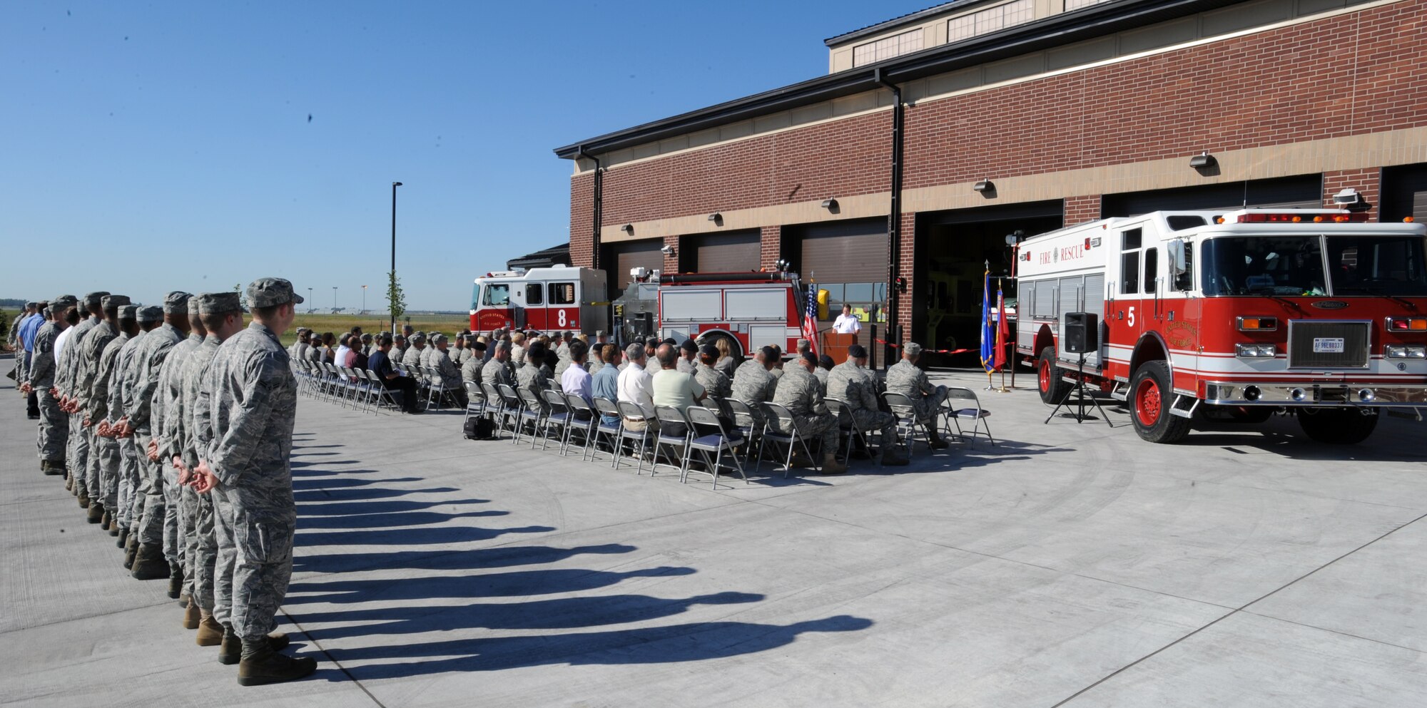 Members and supporters of Grand Forks Air Force Base attend the official ribbon cutting ceremony to unveil the base’s new fire emergency services headquarters building here Sep. 7, 2011. The new fire station replaces the original station built in 1957. (U.S. Air Force photo by Senior Airman Amber E. Bennett)
