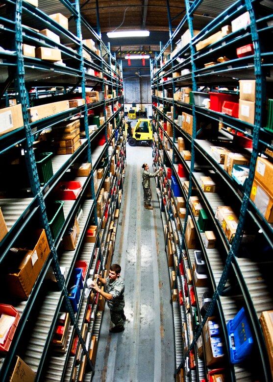 Airmen look for the part number to match the order down one of the many stock aisles in Eglin's supply warehouse.  Eglin's materiel management flight is the largest supply flight in the U.S.  Approximately 125 military and civilian personnel manage more than 50,000 items valued at $875 million.  They also manage more than 300 nonexpendable equipment accounts tracking more than $700 million in assets spread across Eglin and other locations. The materiel management flight is part of the 96th Logistics Readiness Squadron.  (U.S. Air Force photo/Samuel King Jr.)