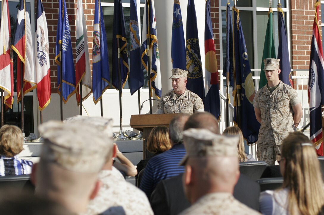 Gunnery Sgt. Donald J. Wilmot, a survivor of the Sept. 11 attack on the Pentagon, shares his experience with Marines, Sailors and civilians during a ceremony honoring the victims of 9/11 at the Marine Corps Air Station Cherry Point headquarters building, Sept. 9. Wilmot is the administrative chief for Marine Air Control Squadron 2.