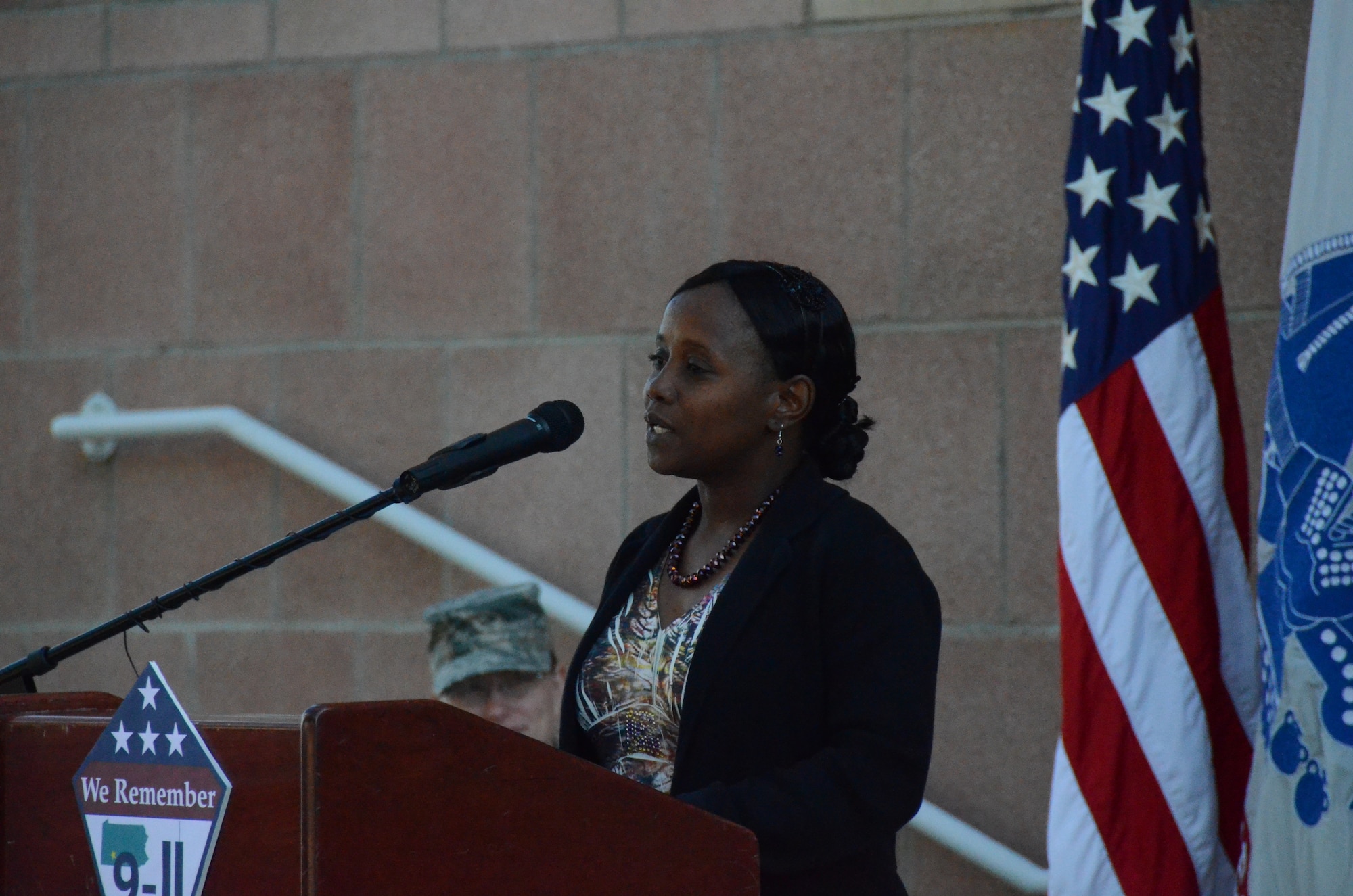 LACKLAND AIR FORCE BASE, Texas -- Cynthia Fleming, a member of the Air Force Center for Engineering and the Environment and one of two keynote speakers at the Bldg. 171 9/11 Remembrance Ceremony Sept. 9, recalls how she saw a plane flying near the Pentagon and saying to a coworker, "that plane is low," just prior to it hitting the Pentagon. U.S. Air Force photo by Steve Davis