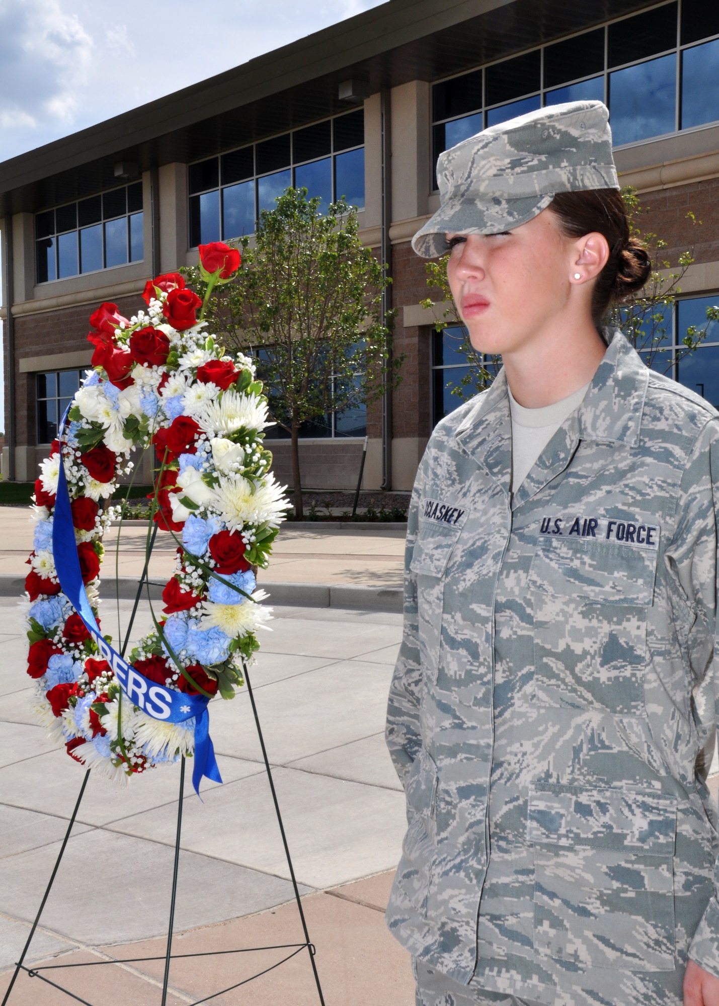 BUCKLEY AIR FORCE BASE, Colo. -- Airman 1st Class Kaitlyn McClaskey, 460th Operations Group, stands a lone vigil Sept. 9, 2011. Soldiers and Airmen honored those lost on Sept. 11, 2001. (U.S. Air Force photo by 2nd Lt. Rachel Freeman)