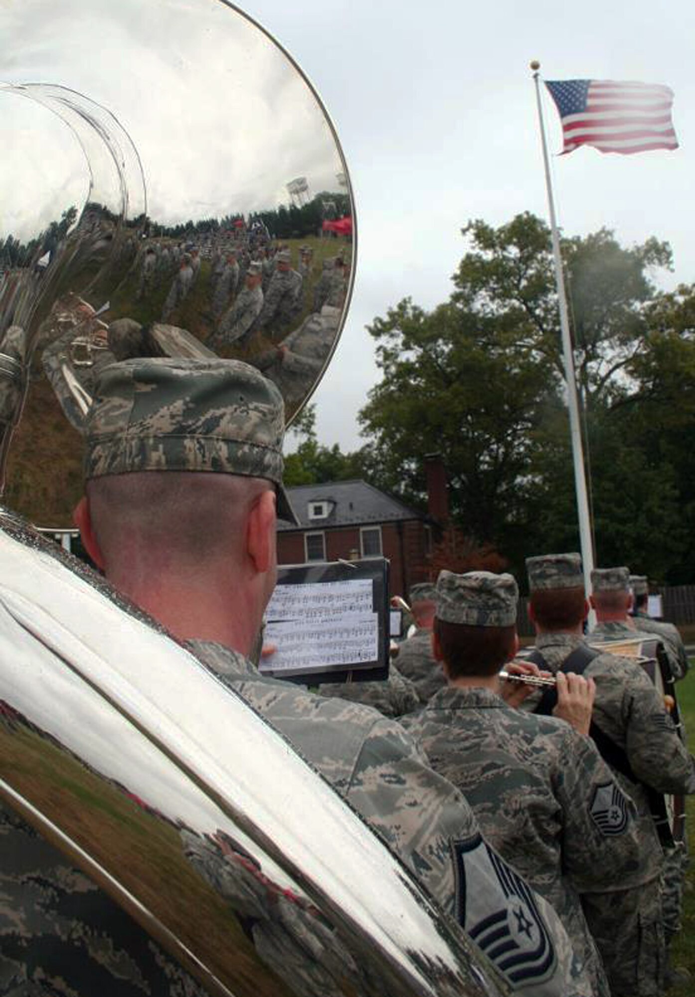 Members of the Air Mobility Command Band of Mid-America participate in a retreat ceremony recognizing the 10th anniversary of the Sept. 11, 2001, attacks on Sept. 9, 2011, at Scott Air Force Base, Ill. (U.S. Air Force Photo/Master Sgt. Scott T. Sturkol) 