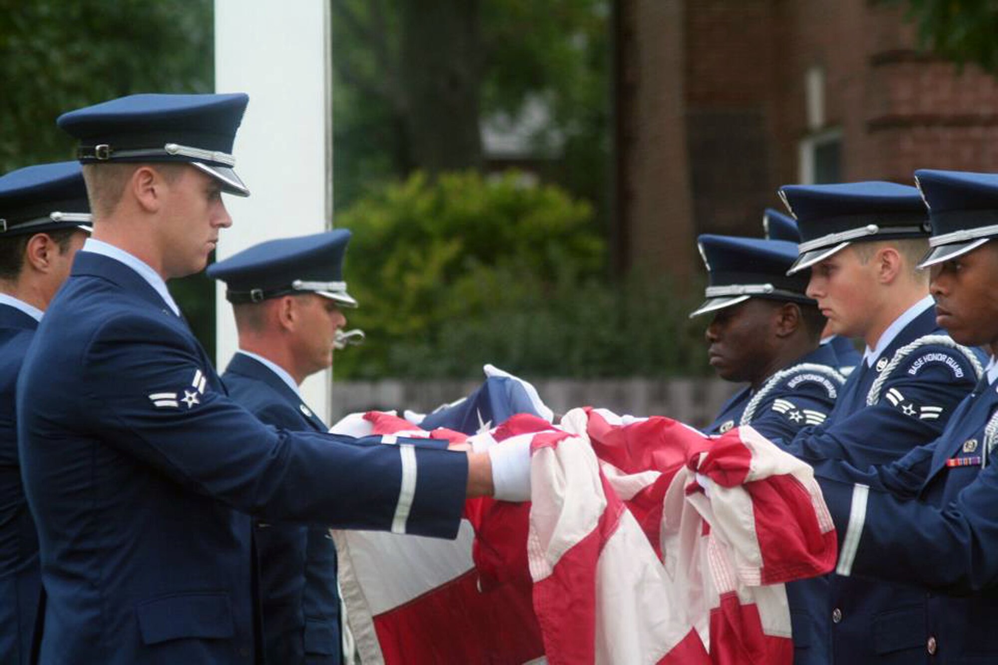 Members of the base honor guard participate in a retreat ceremony recognizing the 10th anniversary of the Sept. 11, 2001, attacks on Sept. 9, 2011, at Scott Air Force Base, Ill. (U.S. Air Force Photo/Master Sgt. Scott T. Sturkol) 