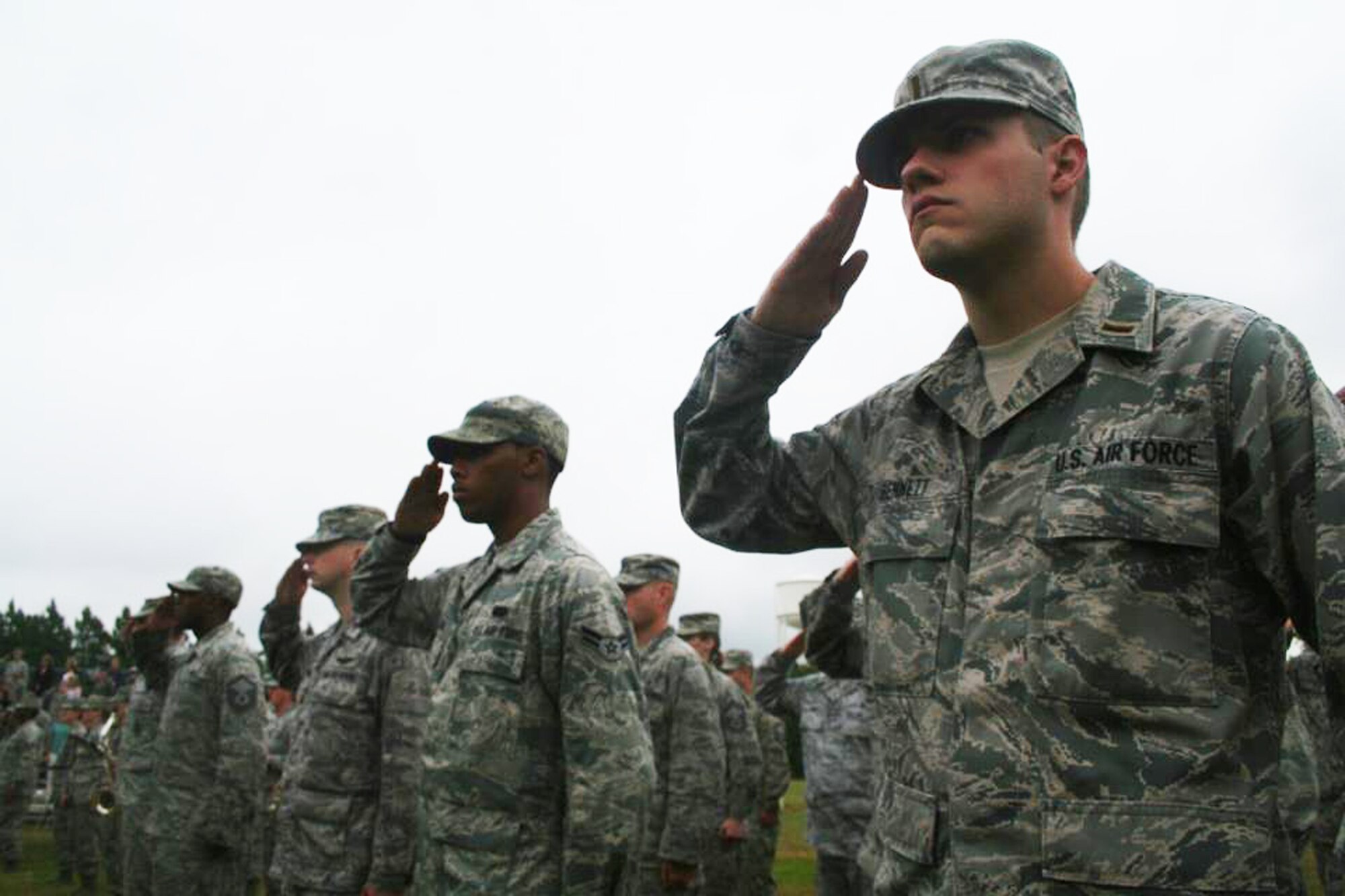 Airmen salute Sept. 9, 2011, at Scott Air Force Base, Ill., during a retreat ceremony recognizing the 10th anniversary of the Sept. 11, 2001, attacks. (U.S. Air Force Photo/Master Sgt. Scott T. Sturkol) 