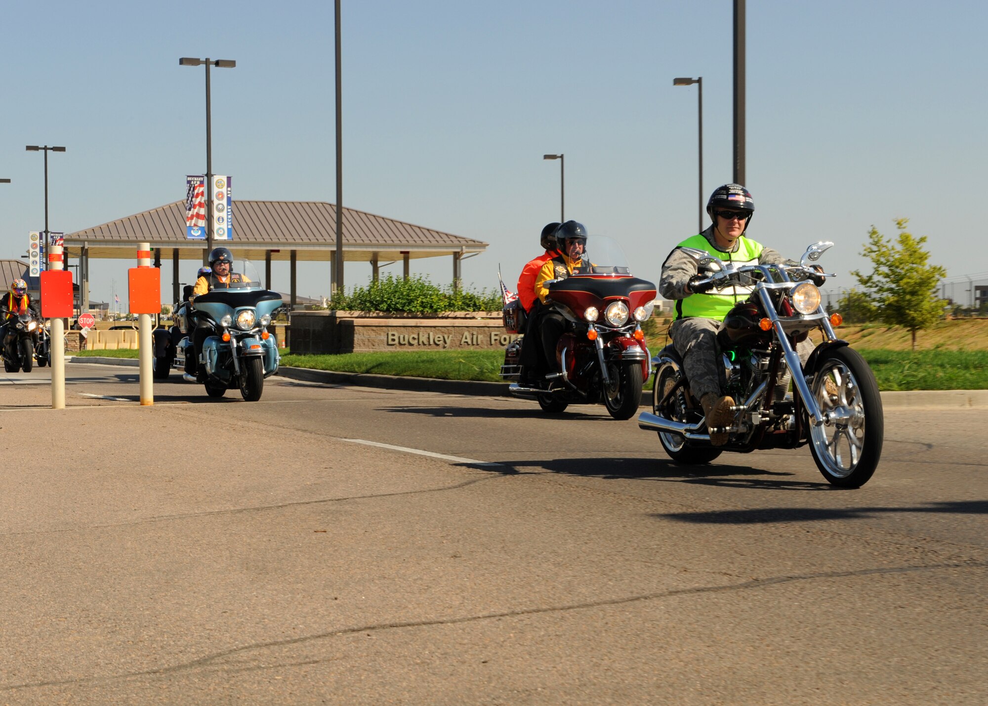 BUCKLEY AIR FORCE BASE, Colo. – Colonel Daniel Dant, 460th Space Wing commander, leads the way Aug 31, 2011. An avid motorcycle enthusiast, Dant encouraged memebers of Team Buckley to go on a relaxing bike ride. (U.S. Air Force photo by Senior Airman Marcy Glass)