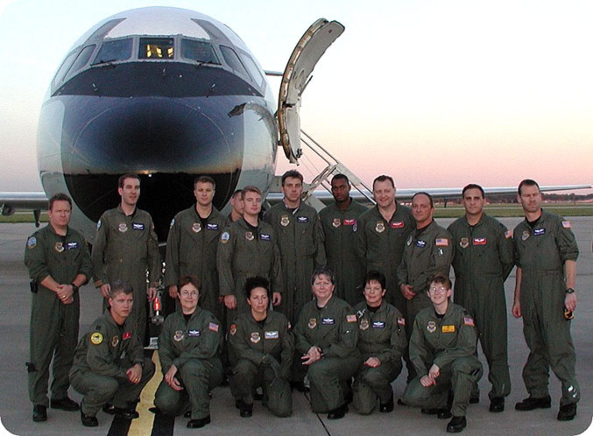 The photo was taken on the Scott AFB flight line with 932nd AW and 375th AW crews just prior to their flights to Andrews AFB, Md. in response to the 9-11 attacks. Team Scott was able to quickly deploy two C-9A Nightingales and their aeromedical crews less than 12 hours after a hijacked jetliner struck the Pentagon. 
Back row, from left: Maj. Robert Witzel, 73rd AS; Capt. Michael Donovan, 73rd AS; 2nd Lt. Kale Jeffery, 73rd AS; Senior Airman Robert Moore, 375th MXS; 1st Lt. Roger DeJean, 73rd AS; Master Sgt. David Rainey, 932nd AES; Staff Sgt. Mark Jaynes, 375th AES; Tech. Sgt. Louie Hawken, 375th AES; Tech. Sgt. Randall Palen, 932nd MXS; Capt. Andrew Reimund, 375th AES; and Tech. Sgt. Shane Cayson, 932nd AES.  
Front row, from left: Capt. Rodney Logan, 375th MDG; Capt. Linda Sitton, 932nd AES; Capt. Sharon Moss, 375th AES, Maj. Treasa Huston, 932nd AES; Senior Master Sgt. Ellen Luhrsen, 932nd AES; and Capt. Melanie Leu.  (Courtesy photo)