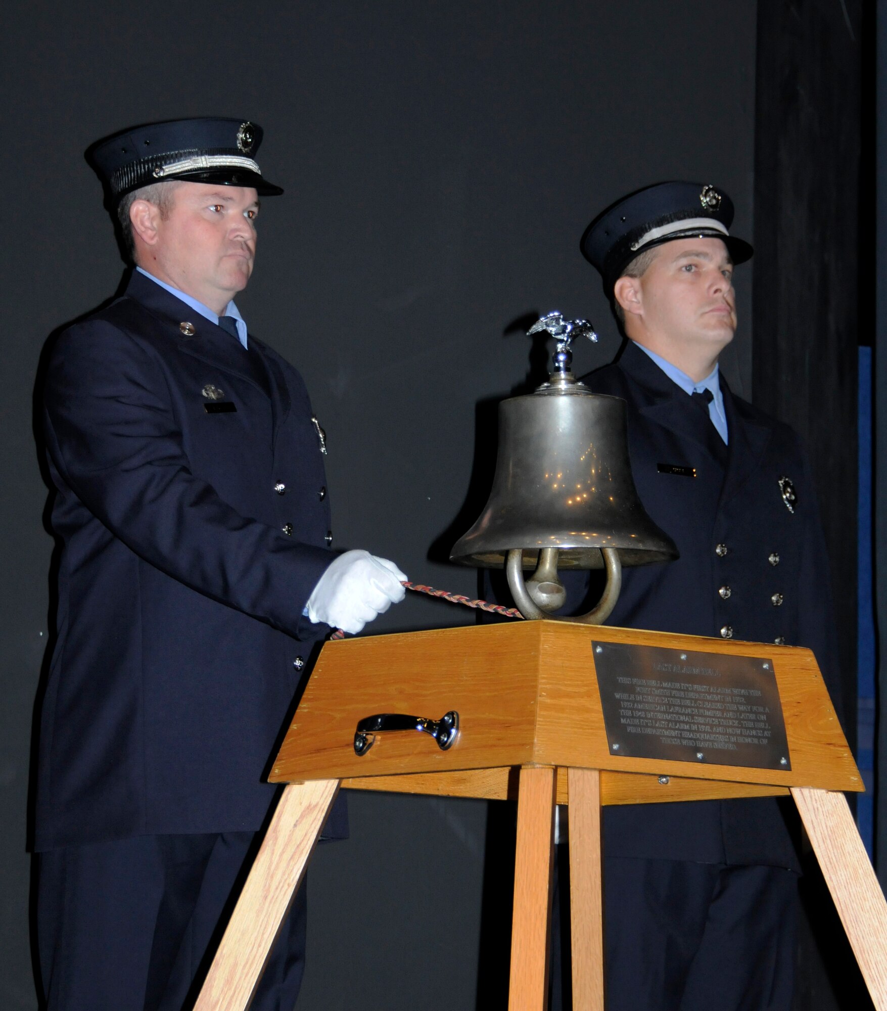 Members of the Fort Smith Fire Department ring “The Last Alarm” bell during a  Sept. 11, 2001, remembrance gathering at the University of Arkansas-Fort Smith Sept. 9, 2011. Col. Tom Anderson, 188th Fighter Wing commander, was a guest speaker during the event, which remembered all those Americans who lost their lives during the terrorist attacks 10 years ago. The event also featured representatives from UAFS, the Fort Smith Fire Department and Fort Smith Police Department. The Fort Smith Fire Department Honor Guard posted the colors during the event. (U.S. Air Force photo by Capt. Heath Allen/188th Fighter Wing Public Affairs)


