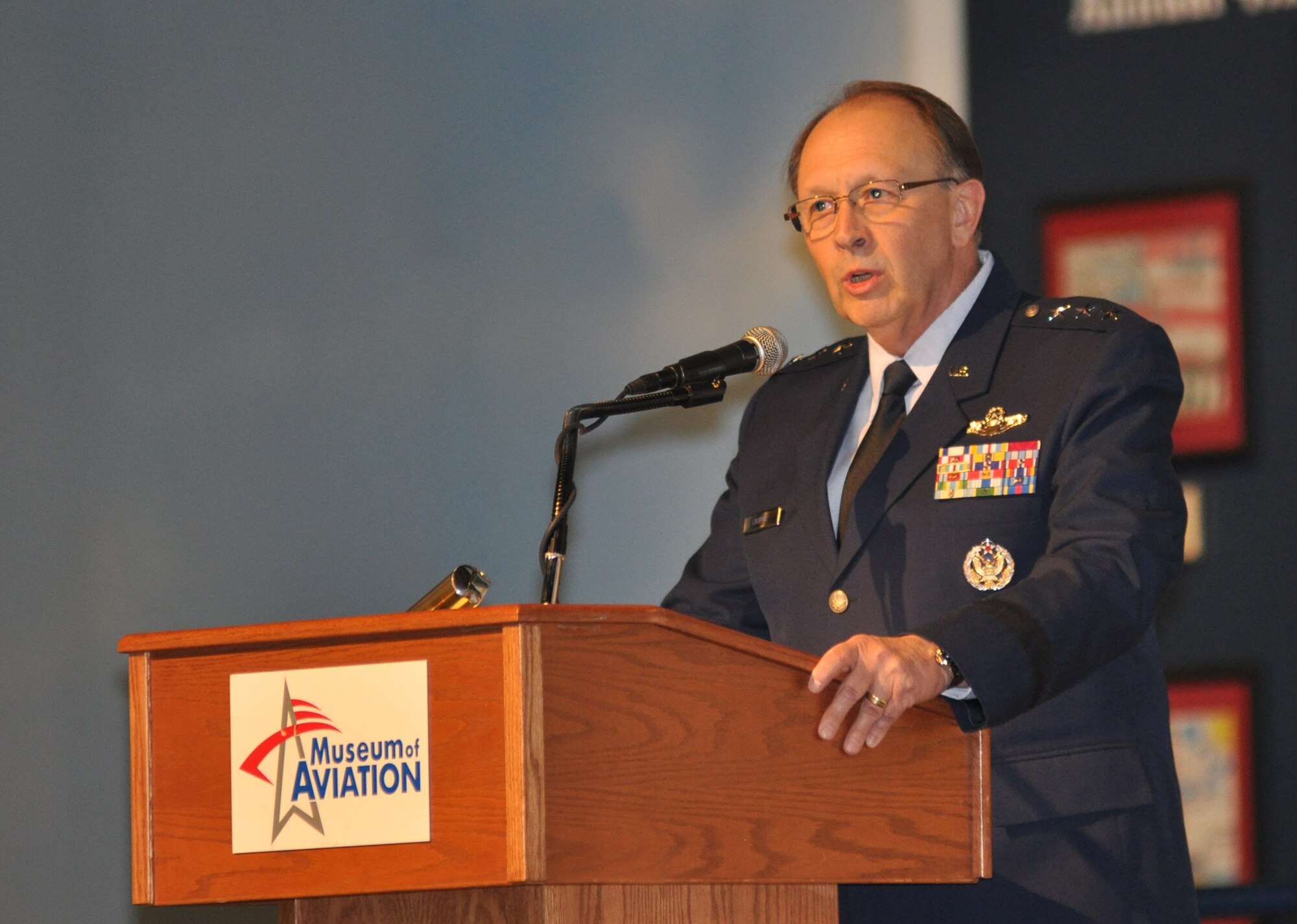 Lt. Gen. Charles E. Stenner, Jr., commander of Air Force Reserve Command, addresses members of the greater Robins Air Force Base, Ga., community gathered at the Museum of Aviation Sept. 9, to commemorate the 10th anniversary of the 9/11 attacks. During the ceremony, an artifact from the 9/11 attack on the Pentagon was symbolically dedicated to the sacrifices of thousands of American men and women who gave their lives on 9/11. The 9/11 Pentagon stone also recognizes the men and women who serve in the U.S. military in defense of freedom. (U.S. Air Force photo/Philip Rhodes)