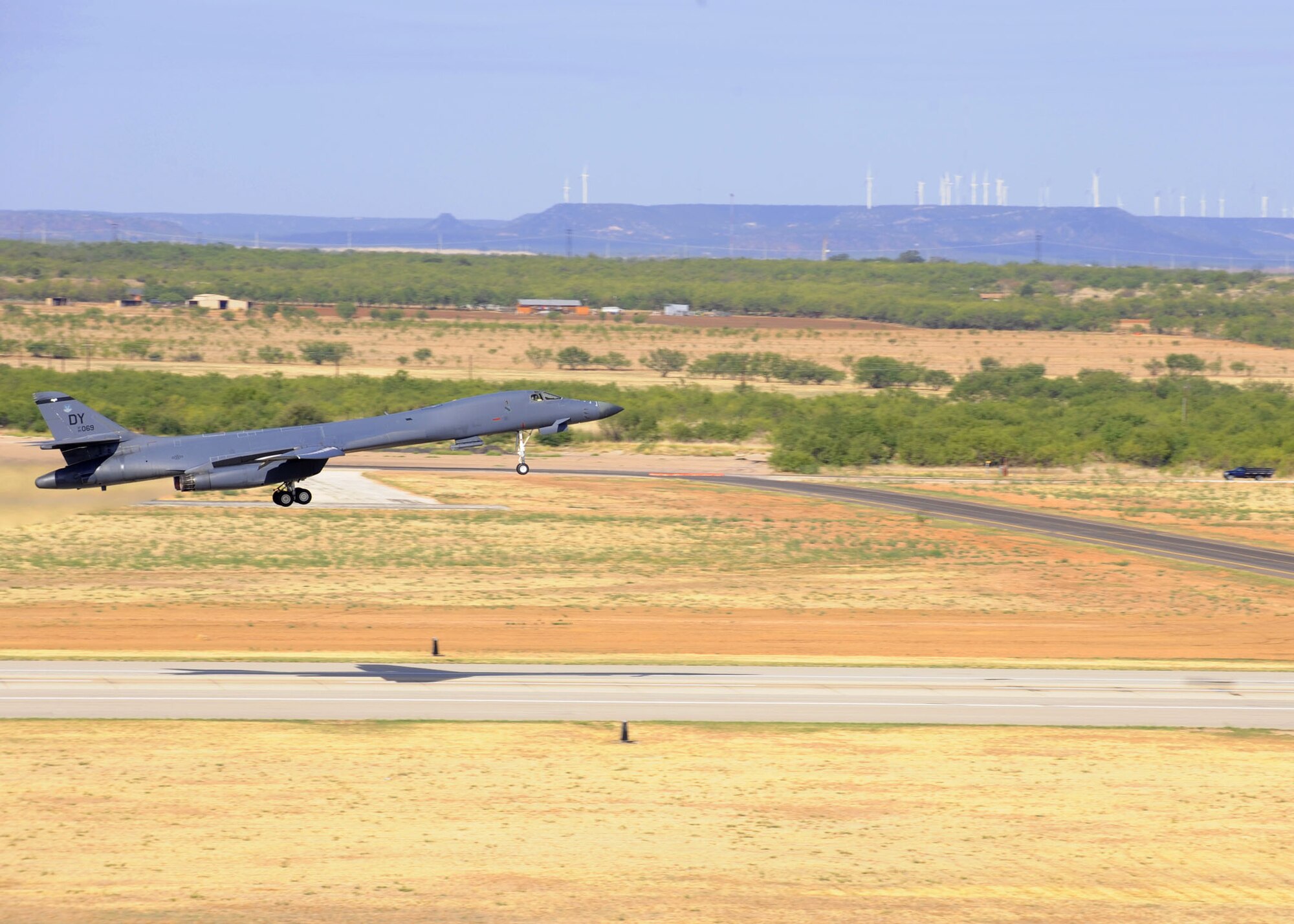 A B-1 Bomber from the 9th Bomb Squadron takes off Sept 8, 2011 at Dyess Air Force Base, Texas, heading to Nellis Air Force Base, Nev., to participate in exercise Green Flag. More than 130 Airmen from the 9th Bomb Squadron and 9th Aircraft Maintenance Unit will participate in the exercise to prepare Air Force and Army personnel for upcoming deployments. (U.S. Air Force photo by Airman 1st Class Jonathan Stefanko/ Released)