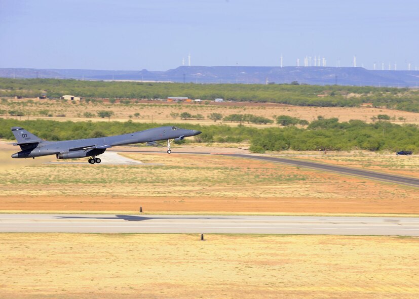 A B-1 Bomber from the 9th Bomb Squadron takes off Sept 8, 2011 at Dyess Air Force Base, Texas, heading to Nellis Air Force Base, Nev., to participate in exercise Green Flag. More than 130 Airmen from the 9th Bomb Squadron and 9th Aircraft Maintenance Unit will participate in the exercise to prepare Air Force and Army personnel for upcoming deployments. (U.S. Air Force photo by Airman 1st Class Jonathan Stefanko/ Released)
