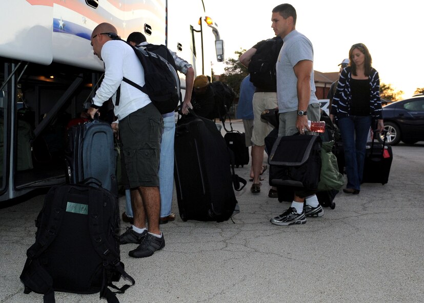 Airmen load their baggage onto busses Sept. 8, 2011 at the Fitness Center on Dyess Air Force Base, Texas, before heading to Nellis Air Force Base, Nev., to participate in exercise Green Flag. More than 130 Airmen from the 9th Bomb Squadron and 9th Aircraft Maintenance Unit will participate in the exercise to prepare Air Force and Army personnel for upcoming deployments. (U.S. Air Force photo by Airman 1st Class Jonathan Stefanko/ Released)
