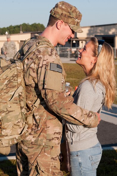 U.S. Air Force 1st Lt. Joshua Loomis, 820th Base Defense Group (BDG), shares a smile with girlfriend Emily Gross prior to departing on a deployment from Moody Air Force Base, Ga., Sept. 9, 2011. Loomis and fellow members of the 820th BDG were tasked to deploy and provide base defense at Kandahar, Afghanistan . (U.S. Air Force photo by Staff Sgt. Joshua J. Garcia/Released) 