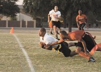 John “Country” Grey scores a first-quarter touchdown as the 59th Dental Squadron goes on to defeat the 543rd Support Squadron 24-0. Grey also made two interceptions in the game. (U.S. Air Force photo/Robbin Cresswell)