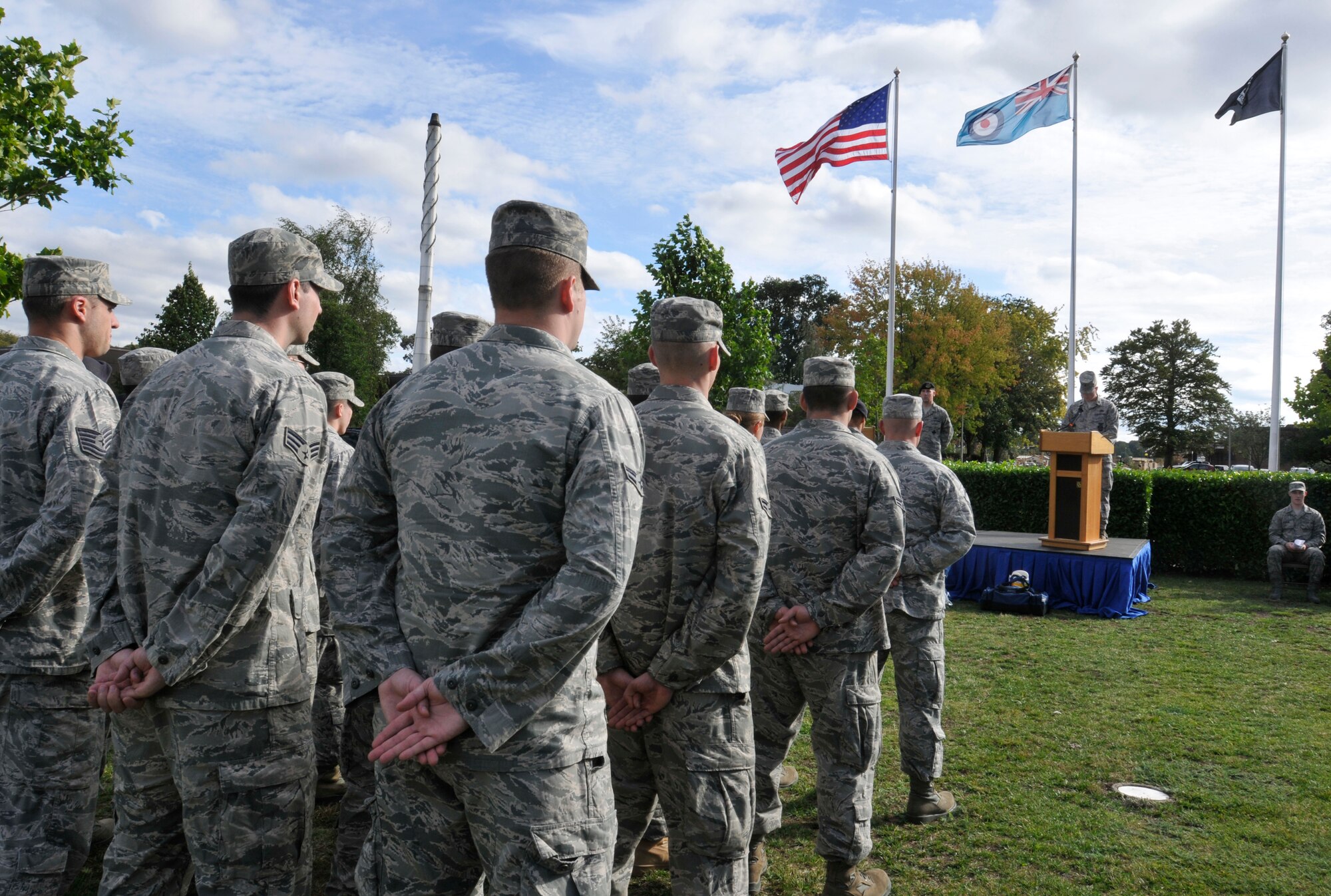 ROYAL AIR FORCE LAKENHEATH, England - Firefighters from the 48th Civil Engineer Squadron stand in formation as Lt. Col. Shawn Thompson, 48th CES commander, speaks during the 9/11 Remembrance Ceremony, Sept. 9, 2011. The ceremony was held to honor those that were lost in the attacks on Sept. 11, 2001. (U.S. Air Force photo by Senior Airman Tiffany M. Deuel))