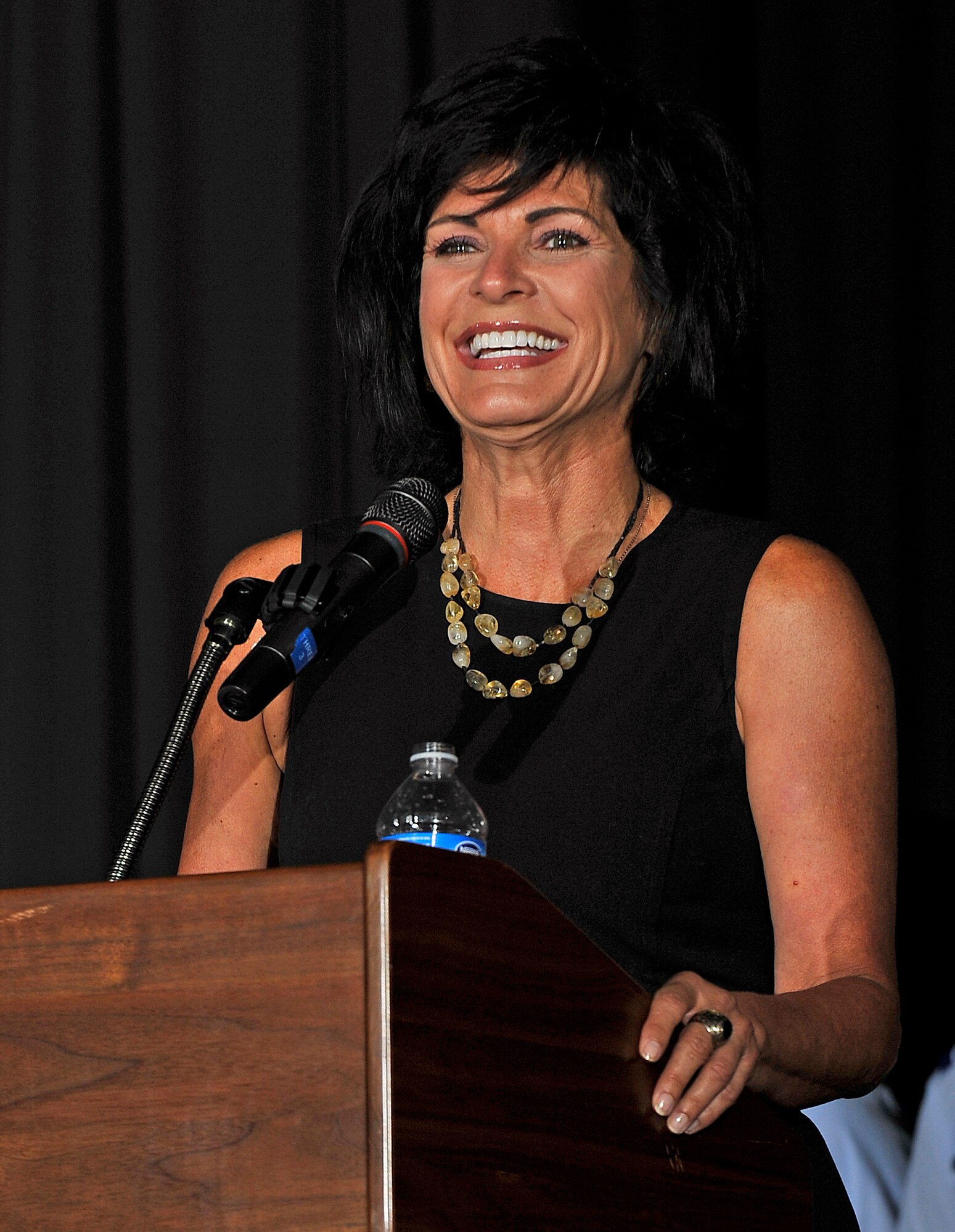 Janine Sijan Rozina speaks to Air Force Academy Preparatory School students during the Prep School's Hall of Fame induction ceremony Sept. 3, 2011. Rozina spoke on behalf of her brother, Capt. Lance P. Sijan, a 1961 graduate of the Prep School and 1965 graduate of the Academy who posthumously earned a Medal of Honor for heroism. (U.S. Air Force photo/Raymond McCoy)