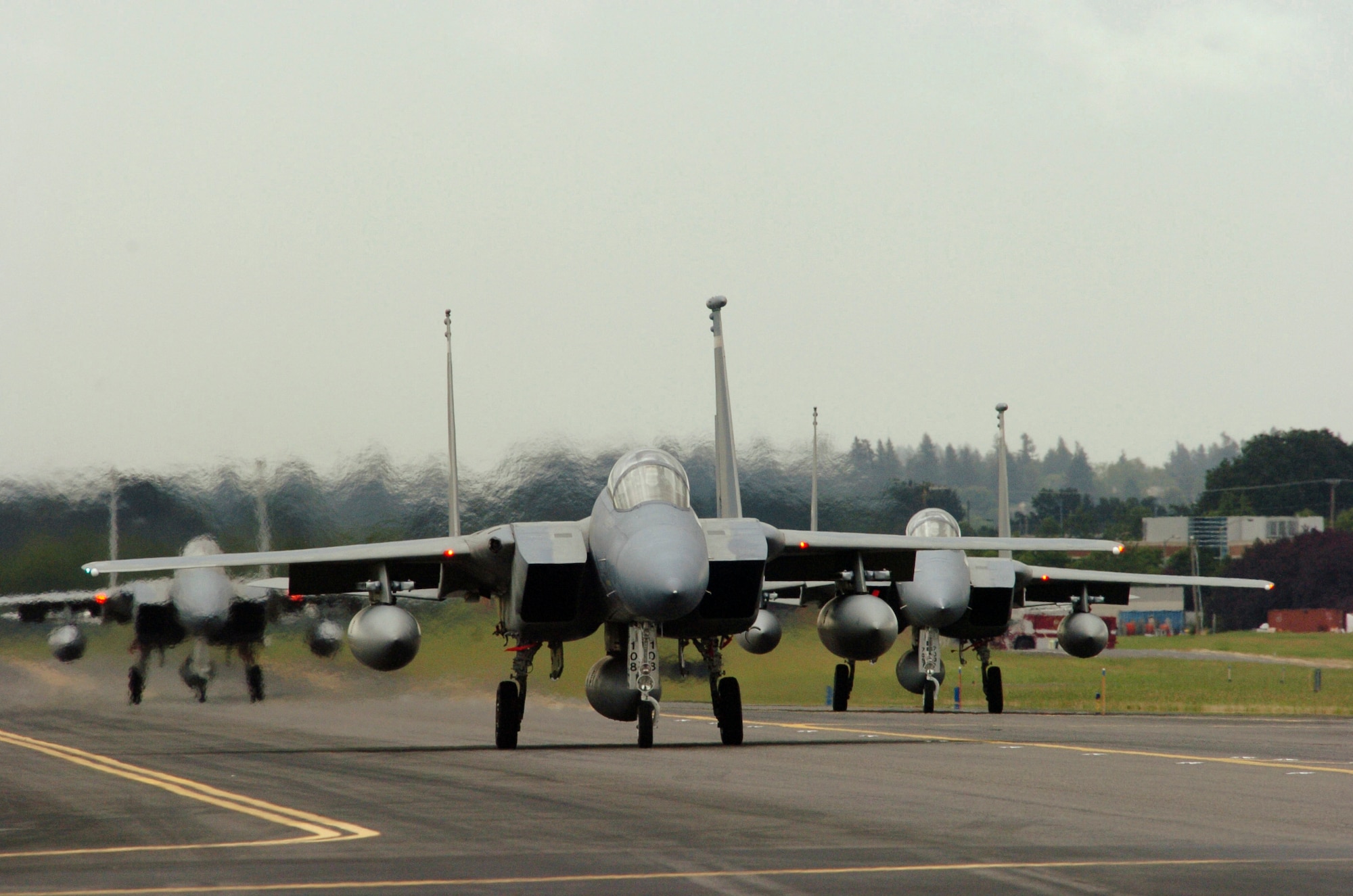 Oregon Air National Guard F-15 Eagles of the 142nd Fighter Wing prepare for take off. On September 11, 2001, it wasn't long before the Western Air Defense Sector (WADS) at McChord AFB, Wash., called on the Oregon Air National Guard to provide air defense for the Pacific Northwest. ORANG pilots began to sit alert in the cockpit of their jets in anticipation of WADS tasking in a very dynamic and unpredictable threat environment. (U.S. Air Force Stock photograph by Tech. Sgt. John Hughel, 142nd Fighter Wing Public Affairs) (RELEASED)