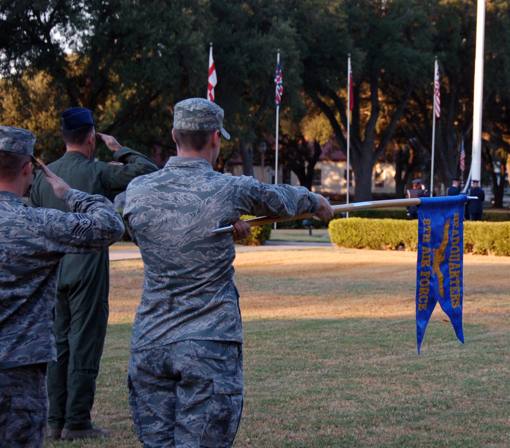 BARKSDALE AIR FORCE BASE, La. – Members of Headquarters Eighth Air Force salute as the U.S. Flag is raised during a 9/11 Reveille and Wreath Laying Ceremony on Barksdale Air Force Base Sept. 9, 2011. The ceremony included a moment of silence, which allowed Barksdale Airmen to reflect upon the tragic losses of Sept. 11, 2001, as well as the service and sacrifices made combating terrorism since that fateful day. (U.S. Air Force photo by Staff Sgt. Brian Stives)