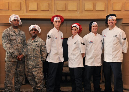 RAF MILDENHALL, England – (From left) Airmen 1st Class Zan Griner, Brandon Castillo, Staff Sgt. Derek Terrill, Airmen 1st Class Jessica Ashe, Jackie Tenzel and Kevin Pordon participated in the Top Chef Competition at the Gateway Dining Facility here, Sept 8, 2011. Hosted by the Food Services Flight, the competition provided training and promoted teamwork in the kitchen. (U.S. Air Force photo by Senior Airman Jerilyn Quintanilla)