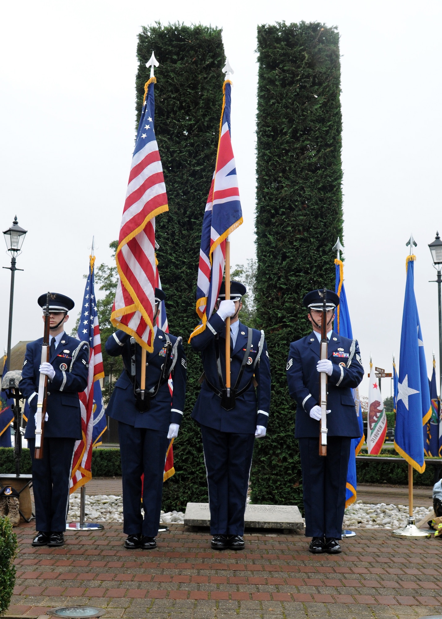 RAF MILDENHALL, England – The RAF Mildenhall Honor Guard posts the colors during a Patriot Day ceremony here Sept. 9, 2011.  The ceremony is in honor of the first responders that risked their lives to save others on 9/11. (U.S. Air Force photo by Staff. Sgt. Tabitha M. Lee)
