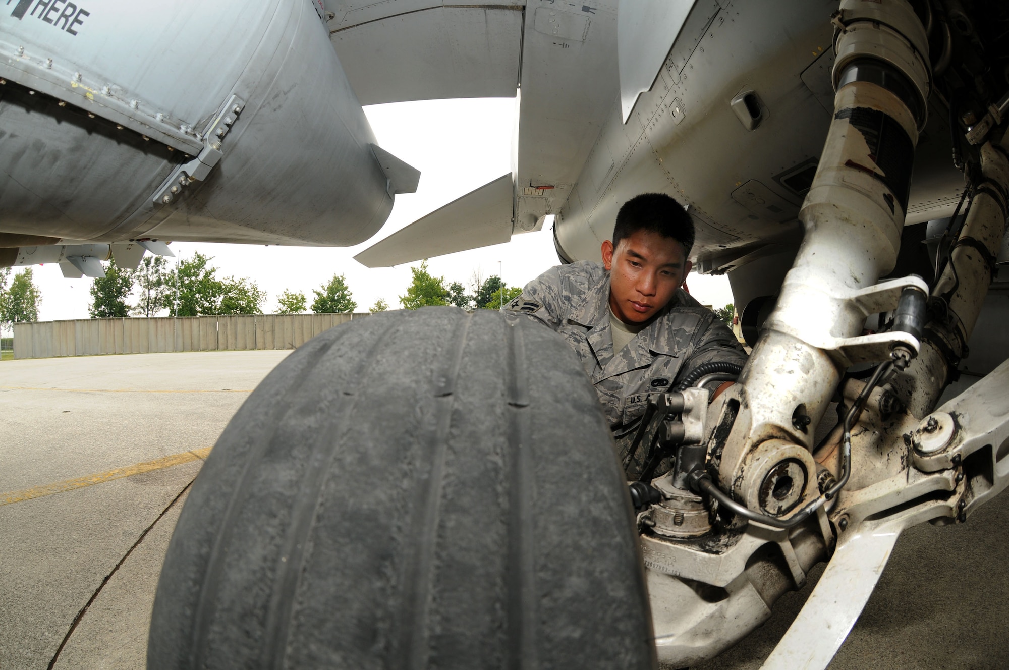 Airman 1st Class John Kulwatno, Gambler Aircraft Maintenance Unit crew chief, performs a basic post-and pre-flight inspection on an F-16 Fighting Falcon July 7 at Aviano Air Base, Italy. The Gambler AMU and the 77th Expeditionary Fighter Squadron from Shaw Air Force Base, S.C., supported Operation Unified Protector for more than five months from Aviano Air Base, Italy in enforcement of United Nations Security Council Resolutions 1970 and 1973. The goal of Operation Unified Protector is to protect civilians and civilian-populated areas in Libya under attack or threat of attack. The mission is focused on three main areas: an arms embargo, a no-fly-zone and actions to protect civilians from attack or the threat of attack. (U.S. Air Force photo/Staff Sgt. Julius Delos Reyes)