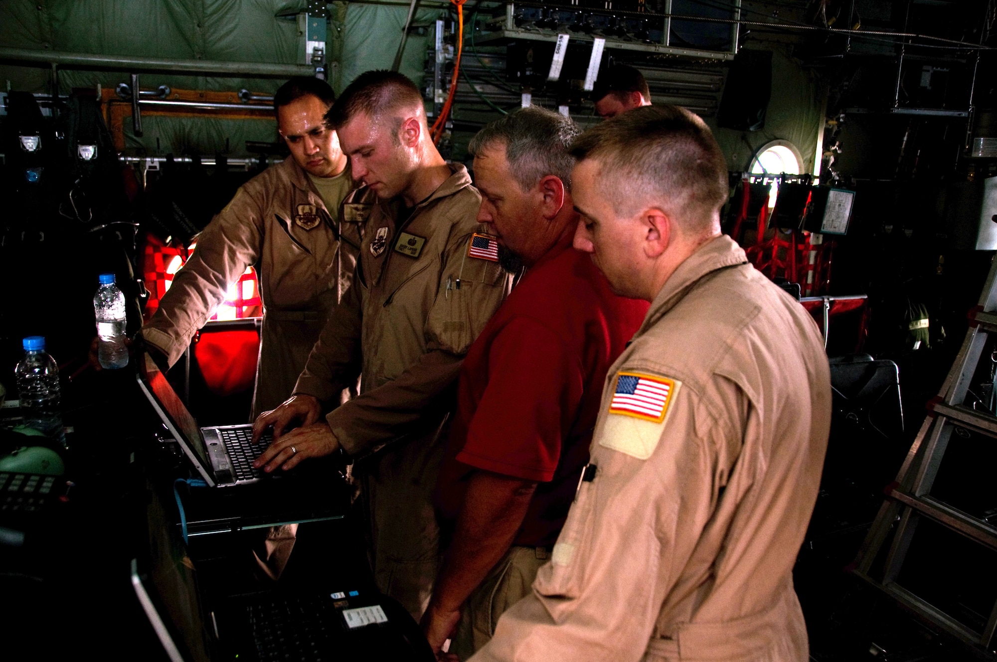 Members of the 379th Expeditionary Communications Squadron viper team run a computer check to see if the system has connection to the Internet, Aug. 26. (U.S. Air Force photo/Senior Airman Eric Summers Jr.)